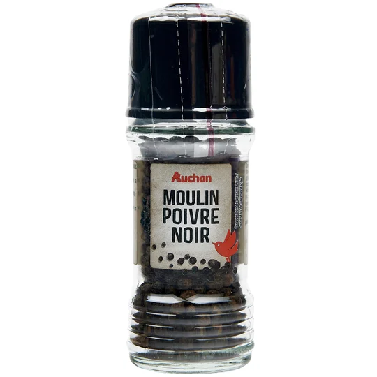 Poivre noir en grains en moulin